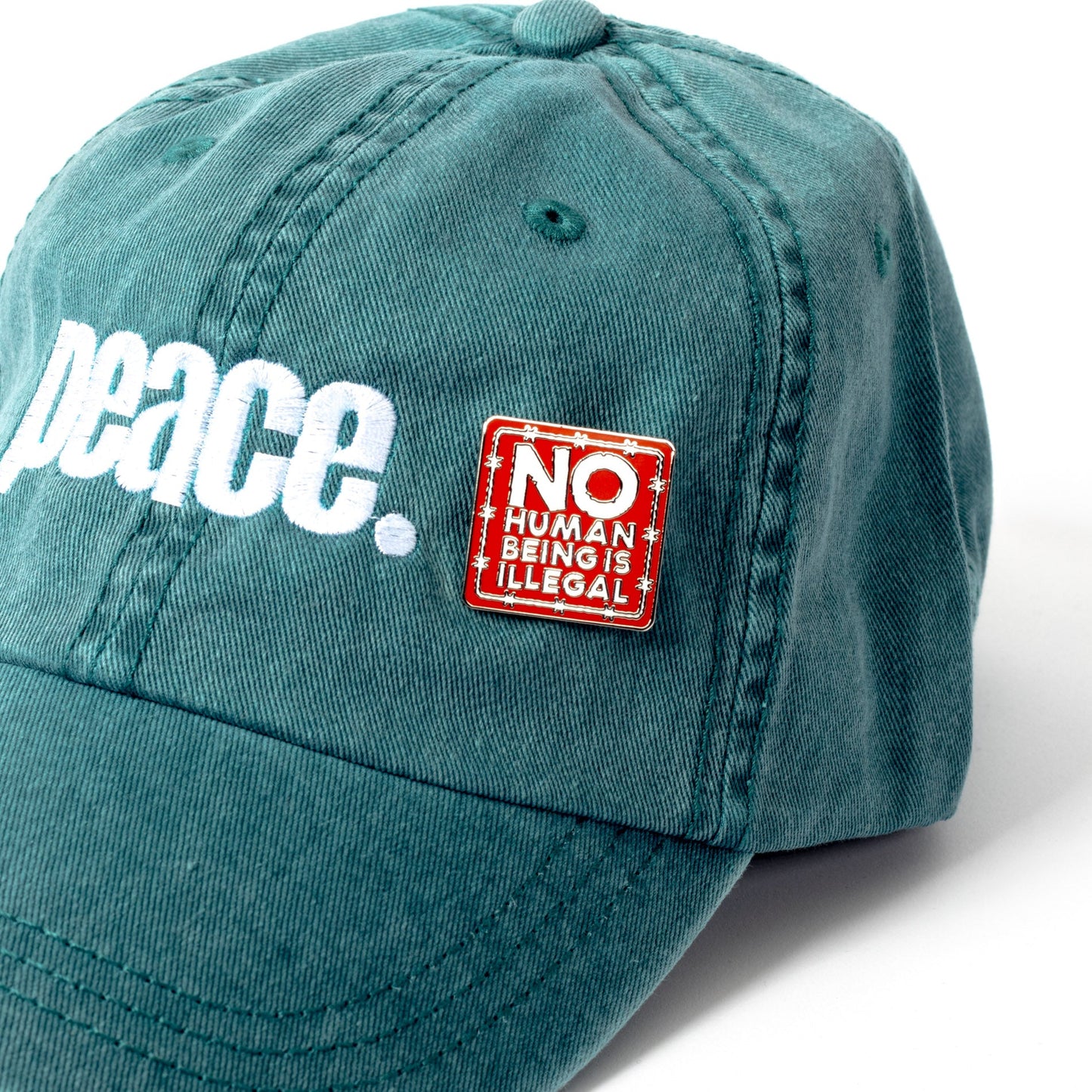 No Human Is Illegal Pin Wear The Peace Pin
